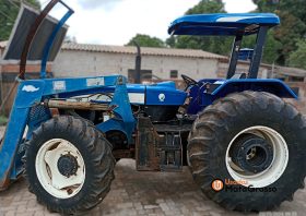 TRATOR NEW HOLLAND 7630 – PNEU BALÃO, LAMINA E PROTEÇÃO DE MOTOR